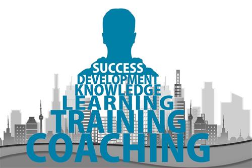 urban buildings with generic male image with words: Success - Development - Knowledge - Learning - Training - Coaching